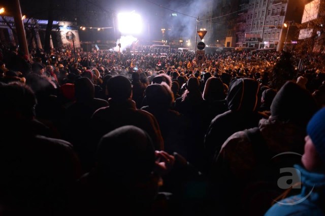 Protesters at Kiev Dynamo Stadium, Hrushevsky St., sniper position to the left of bright light