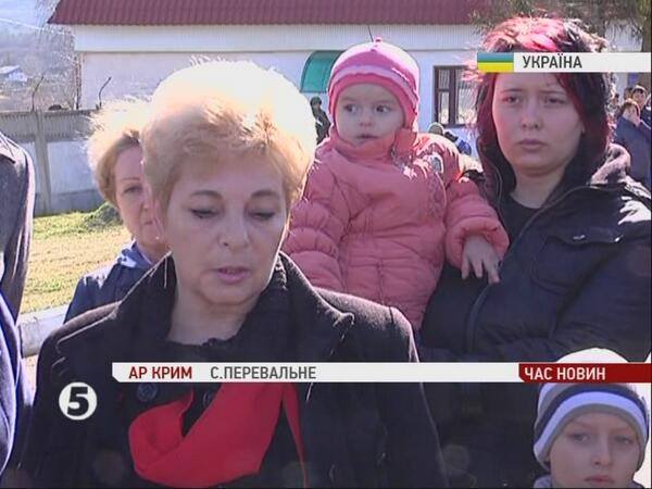 Loved ones of Ukrainian servicemen form a human shield to protect them from Putin's invaders