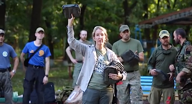 Dr. Ulana N. Suprun handing out IFAKs at the completion of a training program