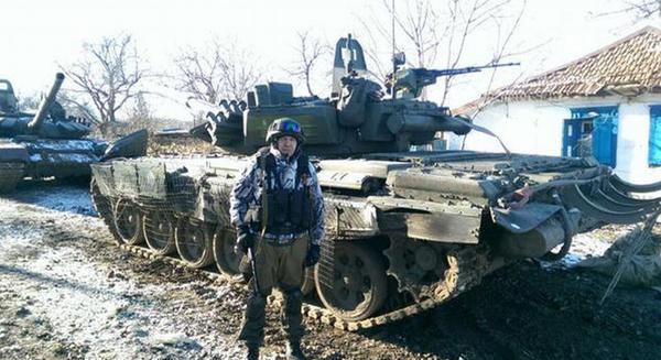A hardworking tractor driver brought his tractor T-72b3 directly from Russia to plow in Debaltseve (Source