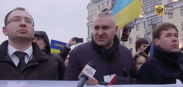 Savchenko defense team lawyers Nikolai Polozov (L) and Ilya Novikov (R) flank Mark Feygin at March 1, 2015 Nemtsov/Savchenko rally in Moscow.