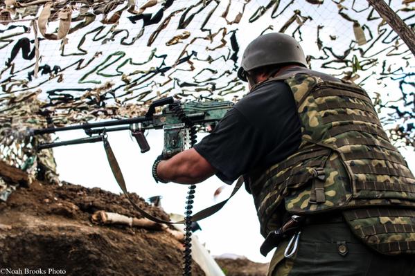 Ukrainian soldier defending Shyrokyne. Photography by Noah Brooks