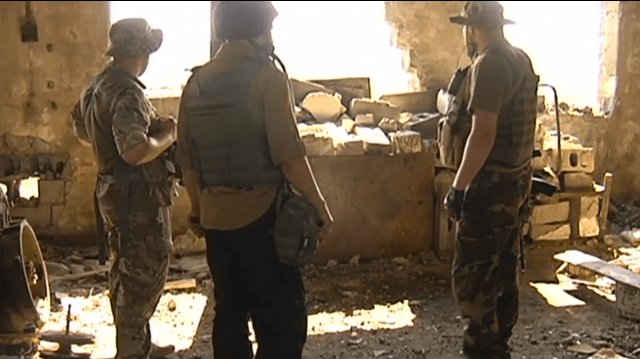 Ukrainian soldiers at Putilov mine, Avdiivka, survey shelling damage. Source: http://uatoday.tv/politics/east-ukraine-fronline-sniper-fire-rocket-shelling-continues-near-avdiivka-459104.html