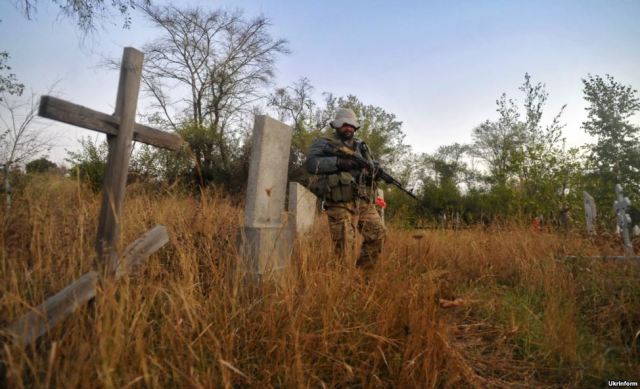 Ukrainian soldier patrolling a section of the "gray zone" (neutral territories). Donetsk oblast, October 1, 2015. Source: http://www.radiosvoboda.org/media/photogallery/27214013.html