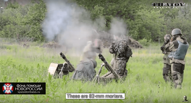 May 31st battle for Mar'inka. Russian proxy grenade launcher unit firing 82 mm mortars at Ukrainian positions 400 m away. Photo: social media video screenshot