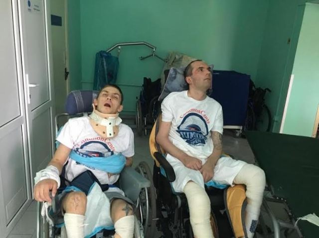 NODUS’ ATO Ward 2: Artur Galtzcov and Roman Kubyshkin need to sit in a wheel chair for at least 3 hours per day as part of their recovery procedure from their comas. Yuliya Grassby is a tennis player and serves on the Board of Directors of the Black Hills Tennis Association. She brought the soldiers tennis tournament t-shirts from the Association is awaiting their recovery to teach them how to play tennis.